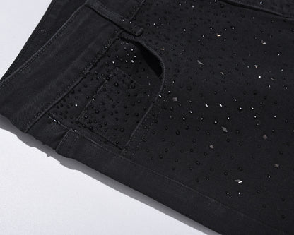 Slim-fit jeans i svart denim med strasspynt