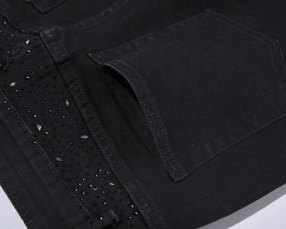 Slim-fit jeans i svart denim med strasspynt