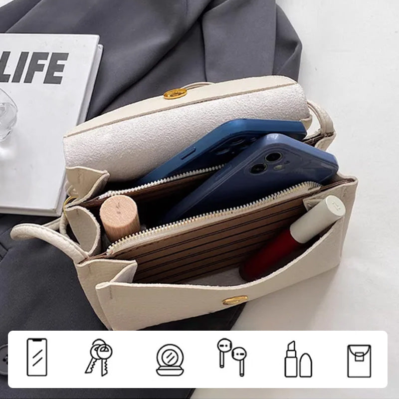 High end mote crossbody-veske for kvinner med elefantanheng