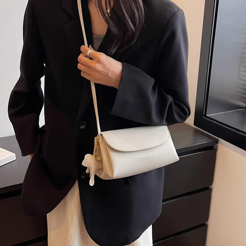High end mote crossbody-veske for kvinner med elefantanheng