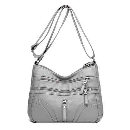 Moteriktig og allsidig crossbody-veske for damer